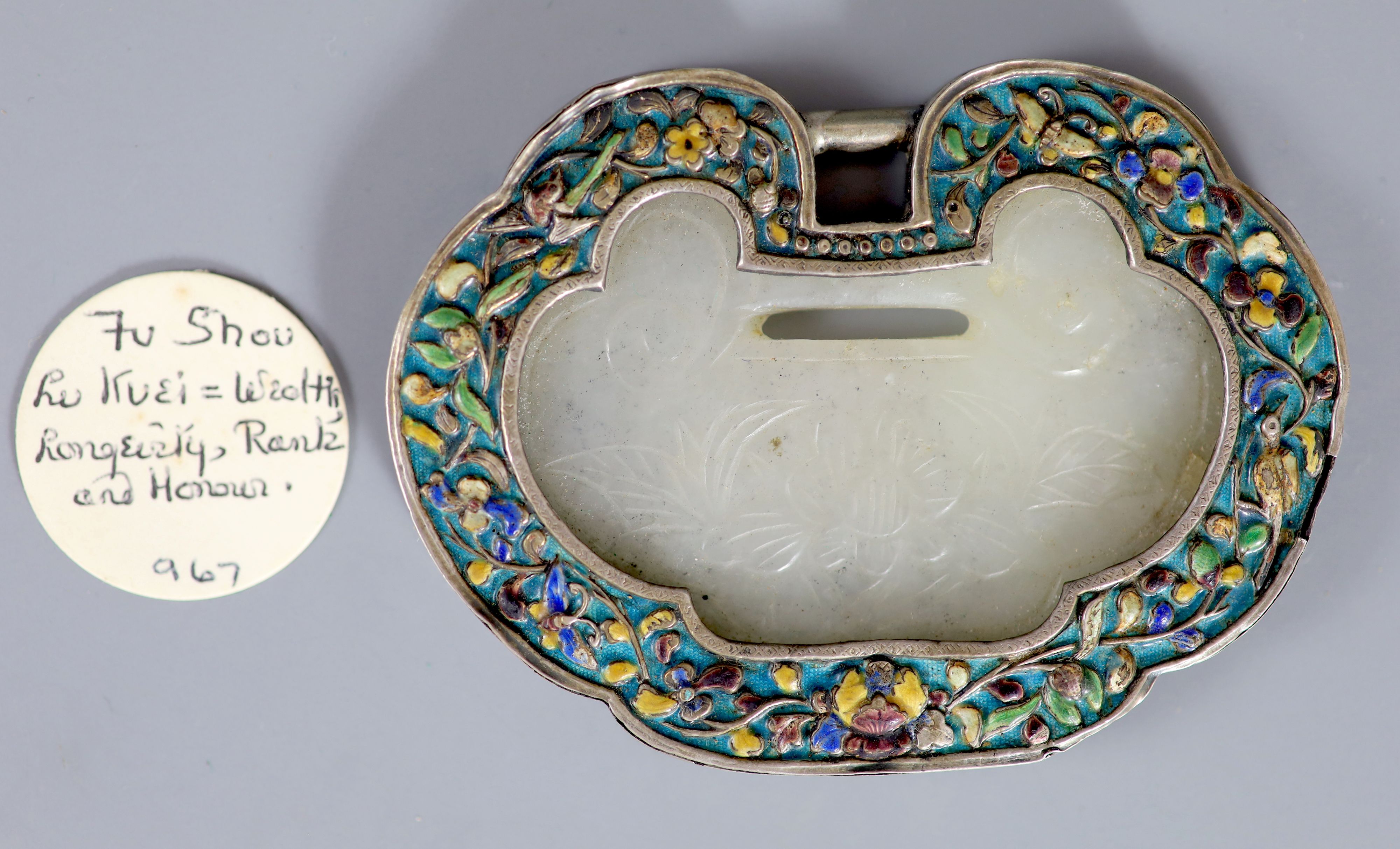 A Chinese silver and enamel mounted white jade spirit lock pendant, Provenance - A. T. Arber-Cooke